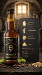 24er Pack Coffee Stout Flasche mit schwarzem Etikett und goldener Schrift, schwarzer Karton mit Zutaten und.